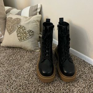 H&M NWOT never worn combat black boots with gum bottoms.